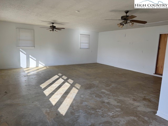 427 J E Gentry Road Crumpler, NC 28617 - Photo 8 of 30 a view of empty room with a window
