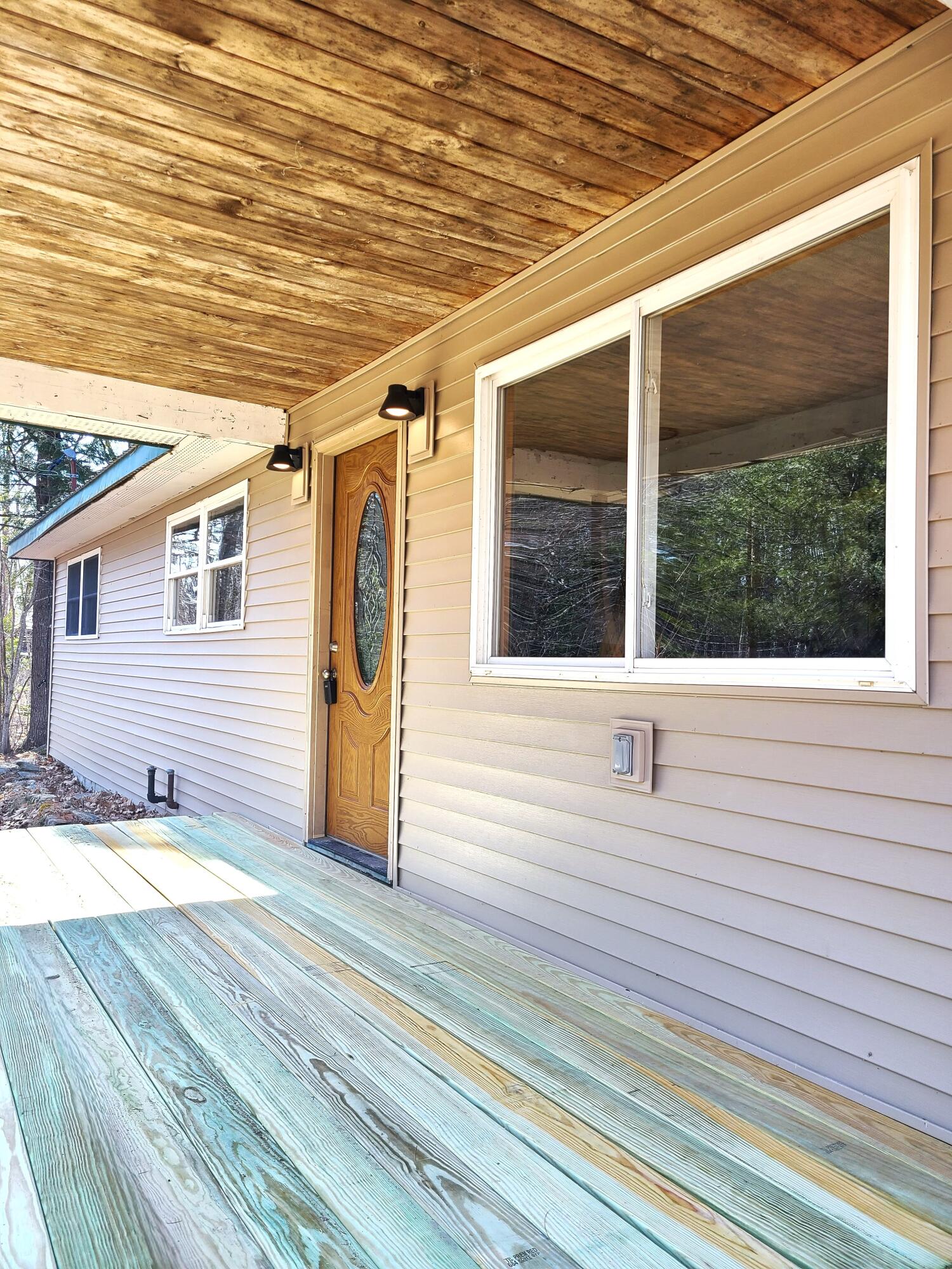 1150 Lakewood Road Madison, ME 04950 - Photo 2 of 32 1150 front door entry deck