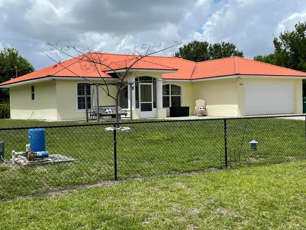 a front view of house with yard