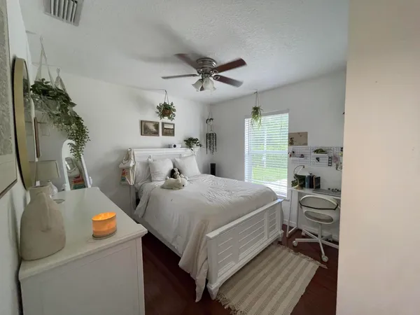 a very nice looking room with a piano and a rug