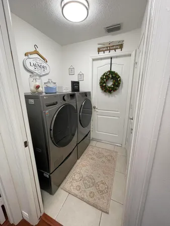 a view of room with air conditioner and a window