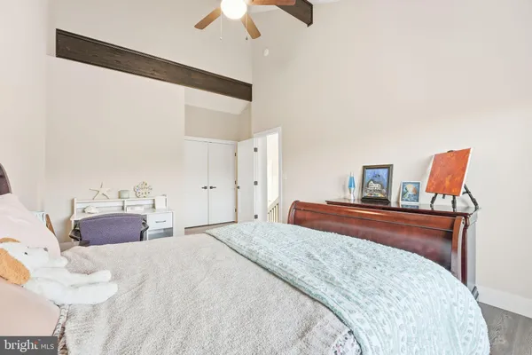 a view of a brick building next to a yard