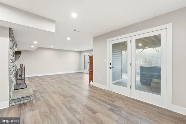 a view of a house with pool table and chairs