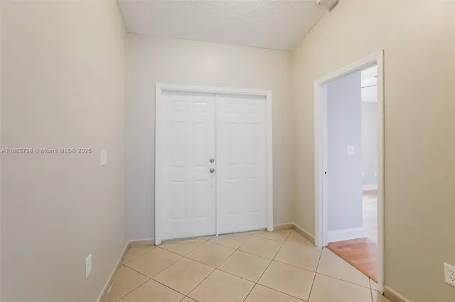 a bathroom with a bathtub and a toilet