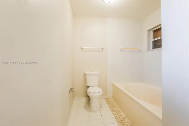 a bathroom with a sink toilet and bathtub