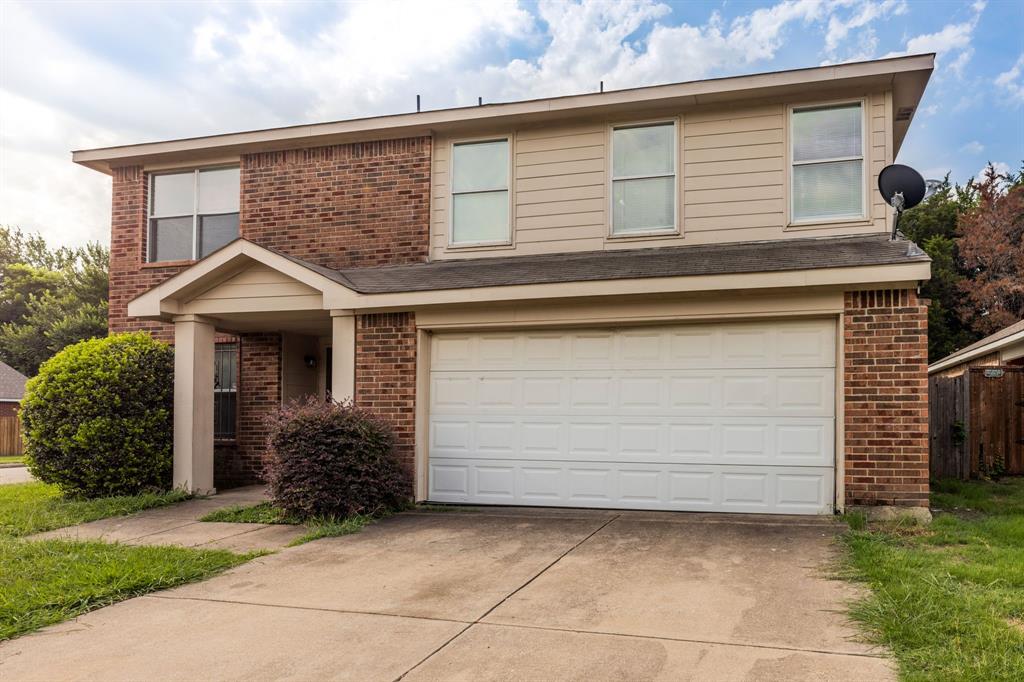 a small white building with a outdoor space