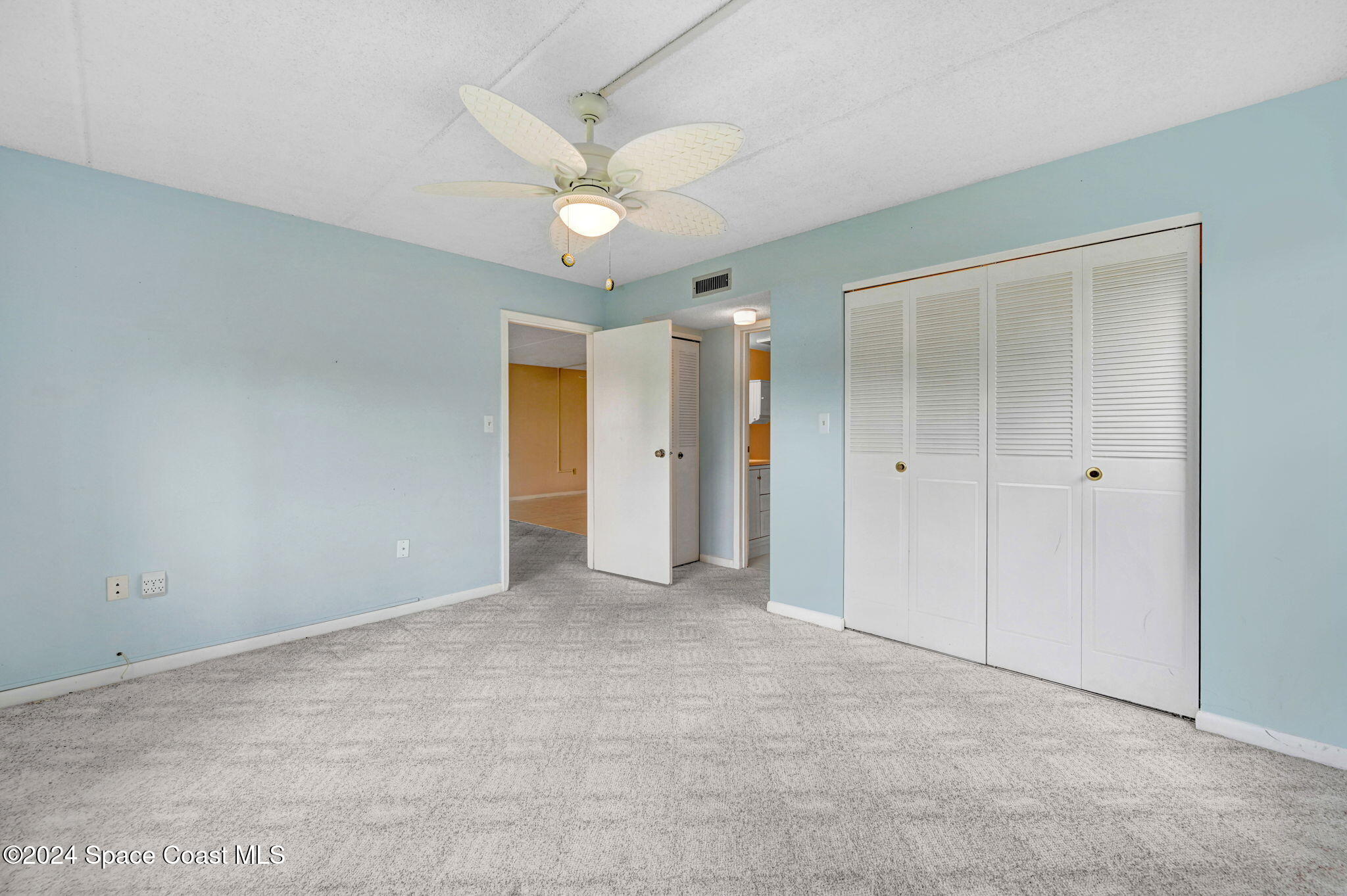 2727 North Wickham Road, Unit 1068 Melbourne, FL 32935 - Photo 12 of 30 Rear Bedroom