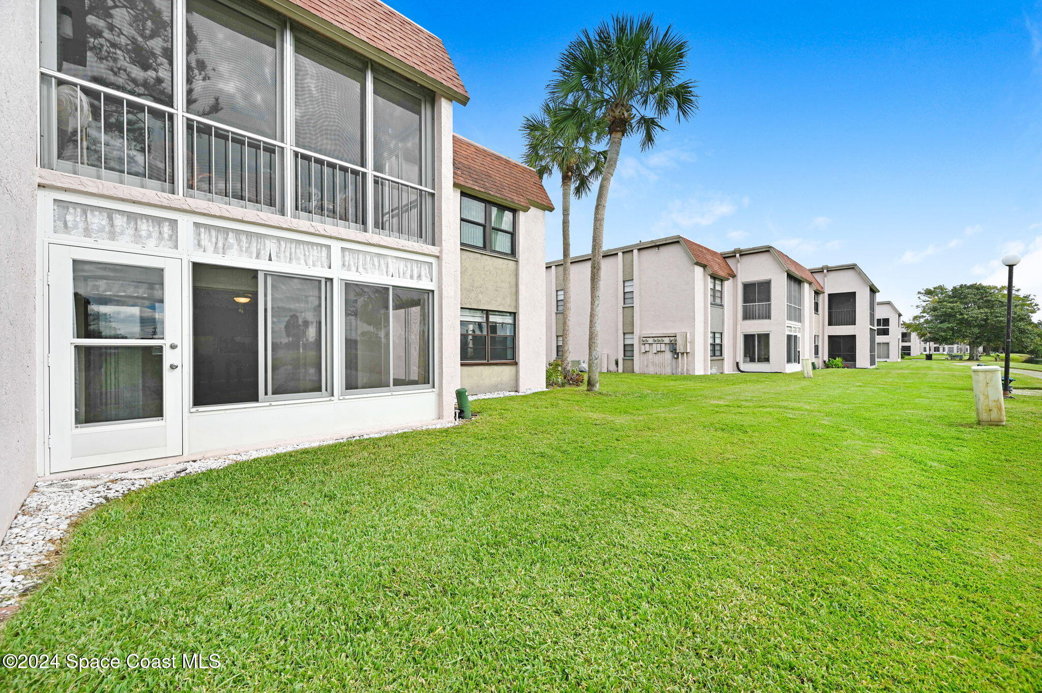 2727 North Wickham Road, Unit 1068 Melbourne, FL 32935 - Photo 24 of 30 Rear of the building