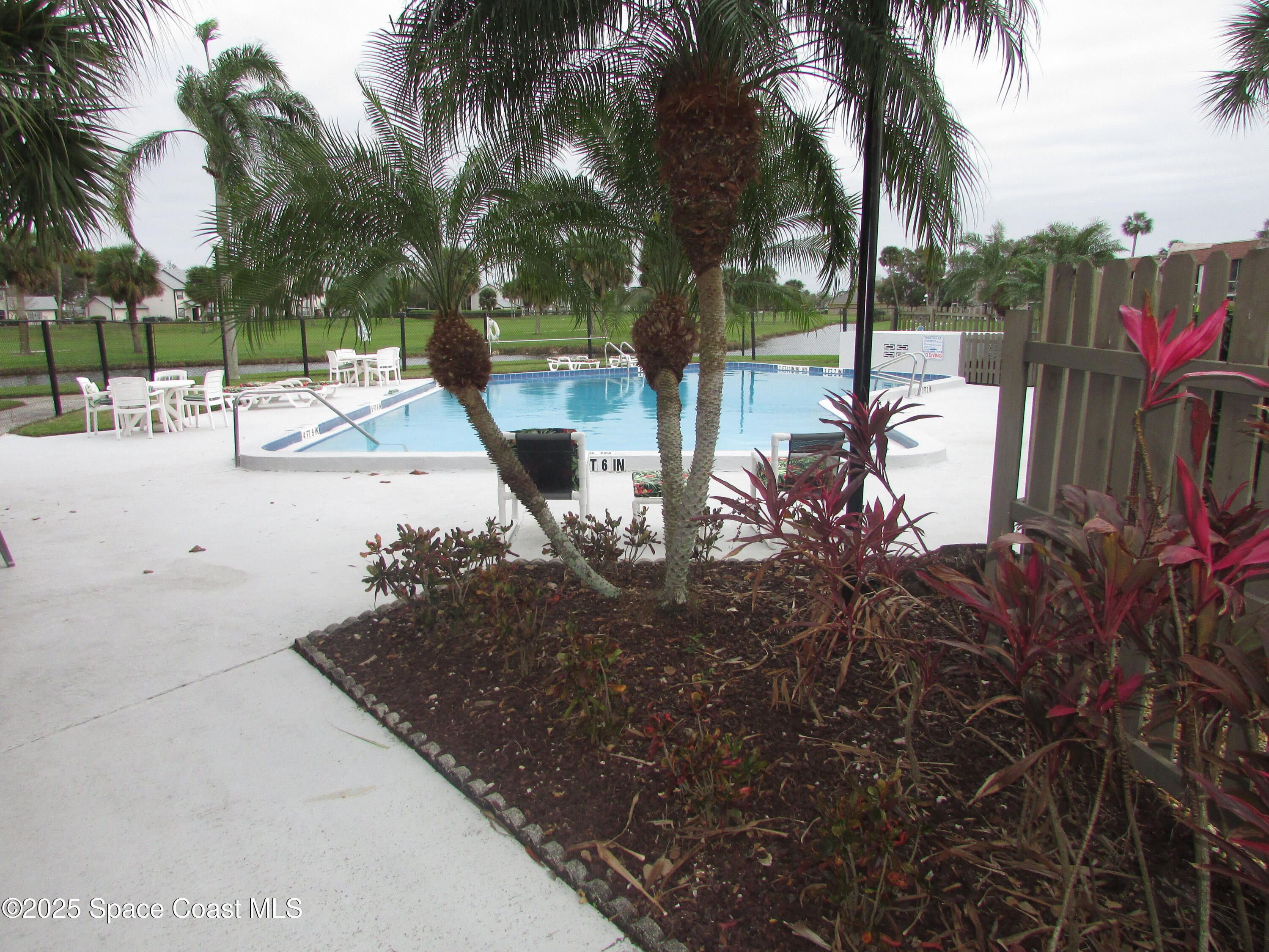 2727 North Wickham Road, Unit 1068 Melbourne, FL 32935 - Photo 27 of 30 Heated Pool