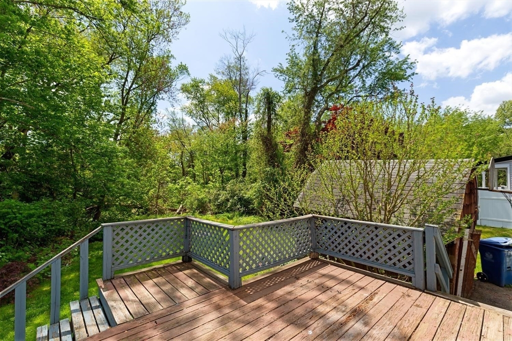19 Butler Avenue Wakefield, MA 01880 - Photo 29 of 33 a view of a roof deck with wooden floor and fence