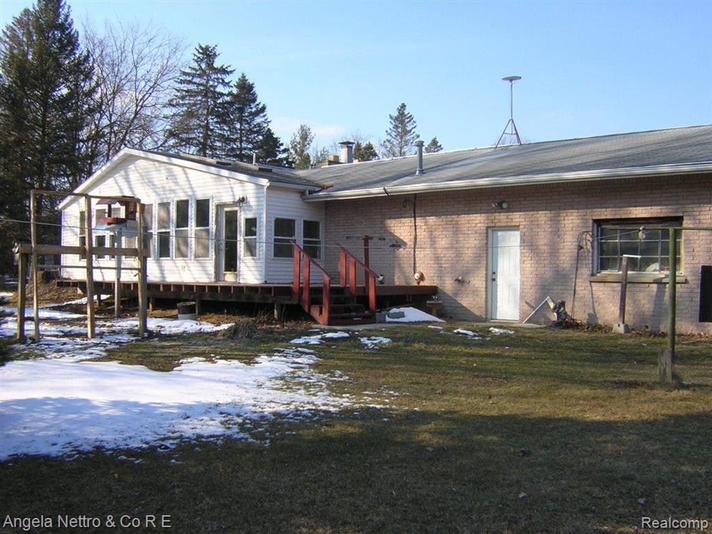 10880 Judd Road Willis, MI 48191 - Photo 9 of 23 REAR VIEW FLORIDA ROOM