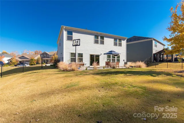 a front view of a house with swimming pool
