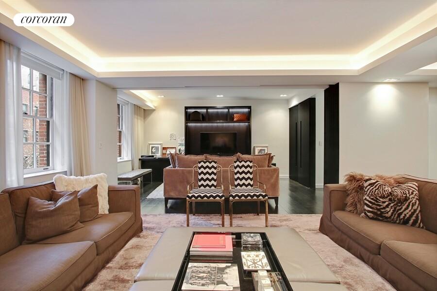 110 East 71st Street, Unit 4 Manhattan, NY 10021 - Photo 16 of 22 a living room with furniture and a rug