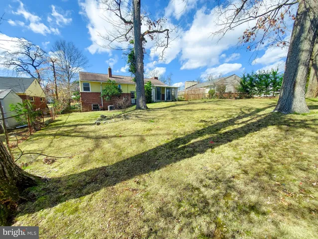 a view of a playground with basketball court