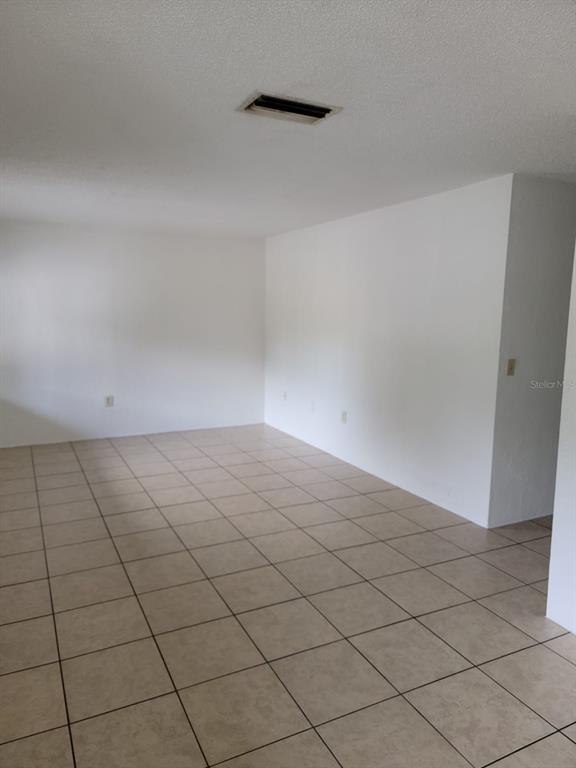 1216 Kennedy Road, Unit 11 Daytona Beach, FL 32117 - Photo 3 of 14 a view of a room