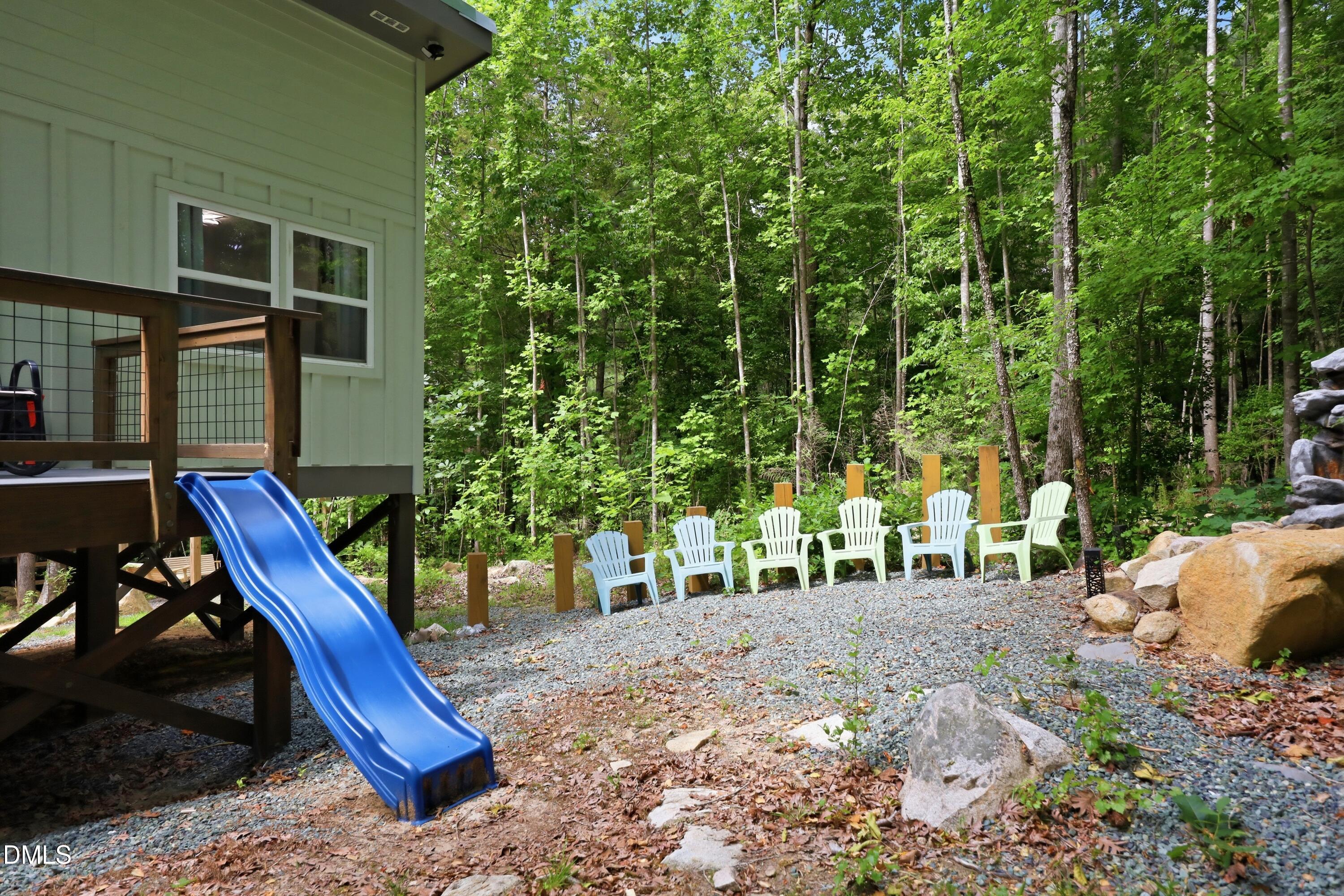 286 Stone Wall Road Pittsboro, NC 27312 - Photo 26 of 71 a view of outdoor space with seating area