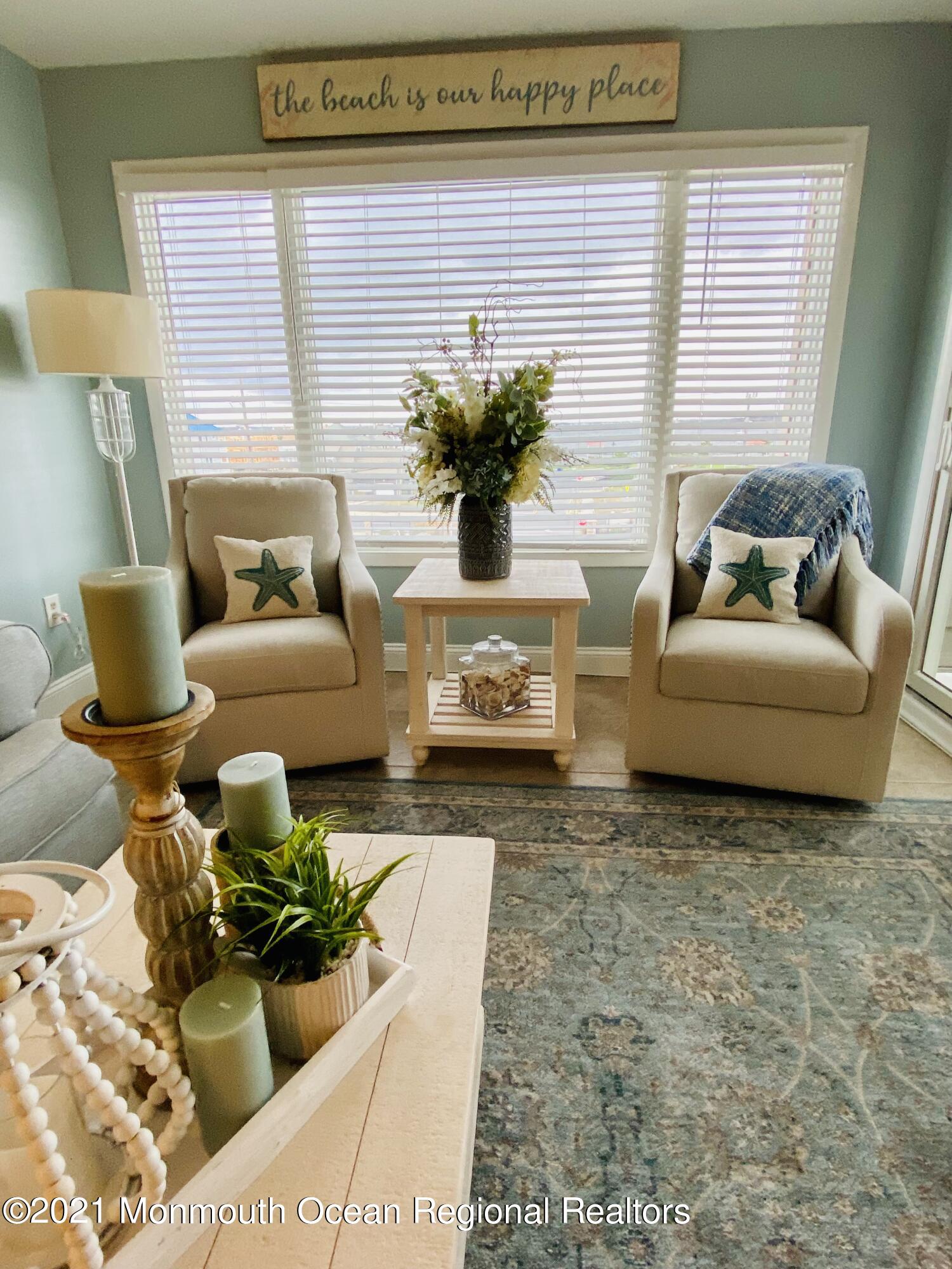 438 Highway 35, Unit 5305 Mantoloking, NJ 08738 - Photo 4 of 40 a living room with furniture and potted plant