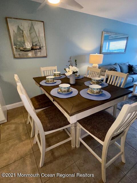 438 Highway 35, Unit 5305 Mantoloking, NJ 08738 - Photo 8 of 40 a view of a dining room with furniture