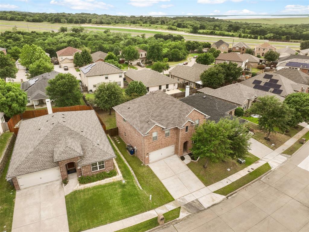 6522 Portside Ridge Lane Dallas, TX 75249 - Photo 33 of 37 Aerial perspective showcasing a residential area with varied architectural styles