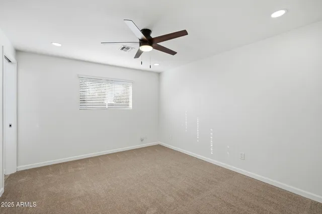 a view of swimming pool with a backyard