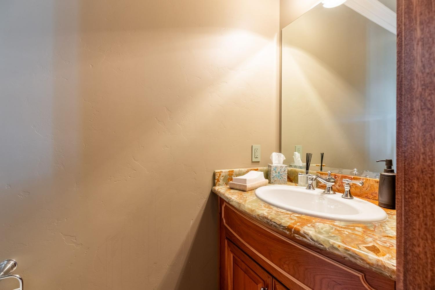 1140 Cold Springs Road Placerville, CA 95667 - Photo 37 of 98 a bathroom with a sink and a mirror