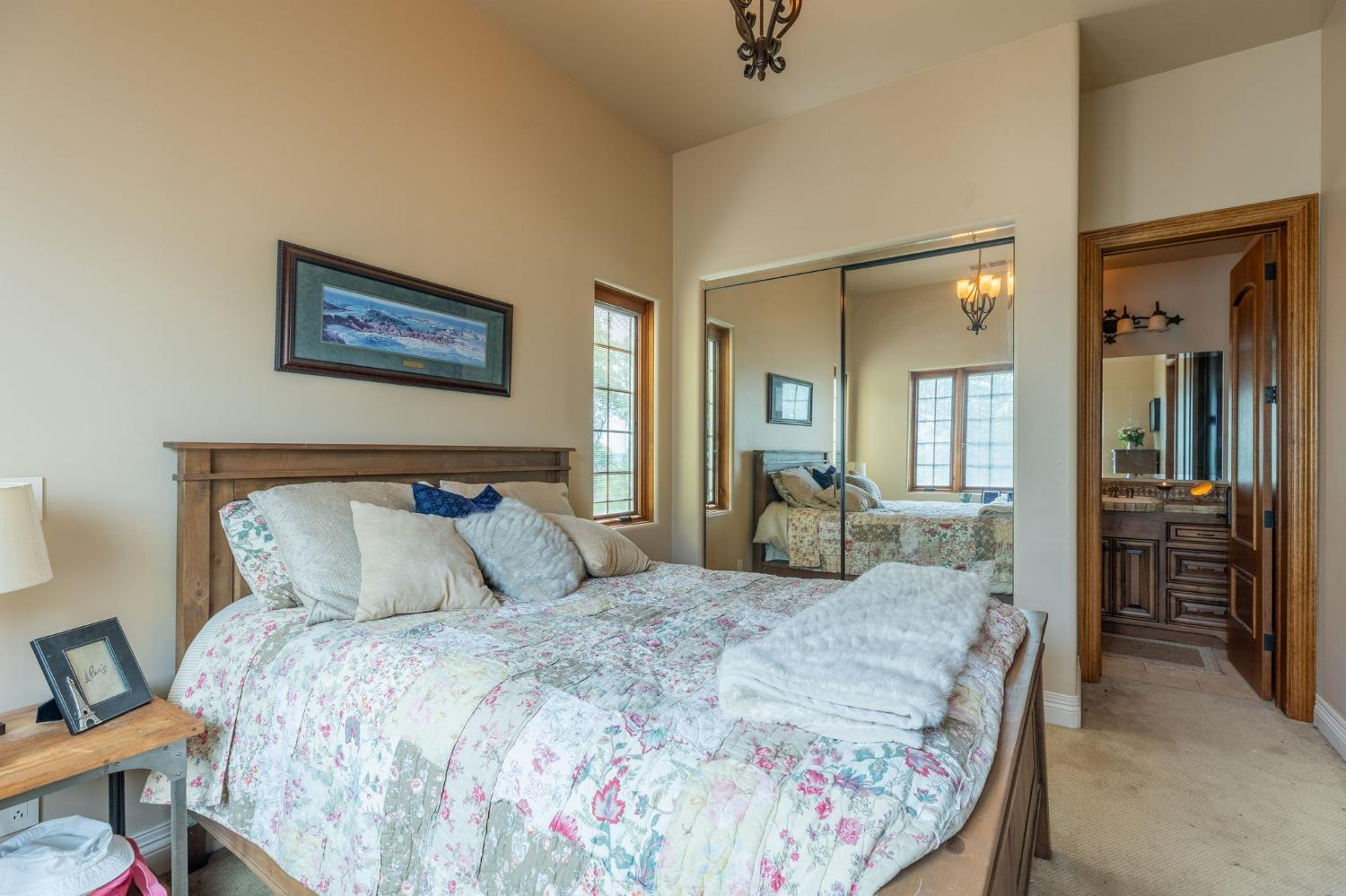 1140 Cold Springs Road Placerville, CA 95667 - Photo 68 of 98 a bedroom with a bed and a mirror