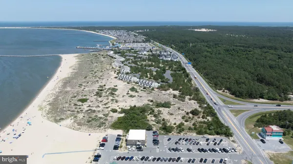 a kitchen with stainless steel appliances a sink and cabinets