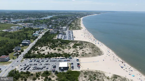 a living room with baby bed furniture and a window