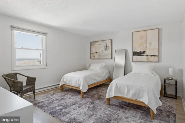 a view of a chairs and table in patio