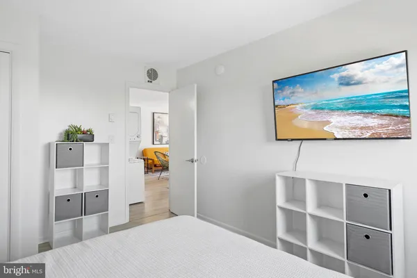 a view of a street with a building in the background