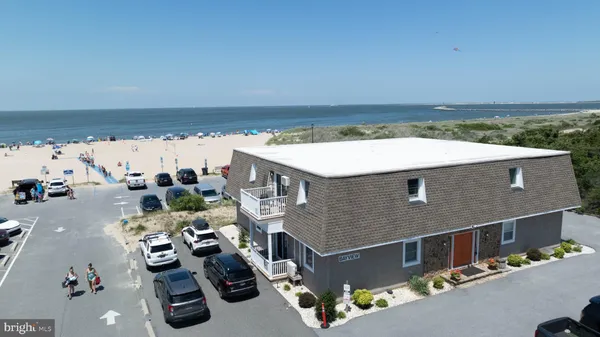 a view of swimming pool with seating space