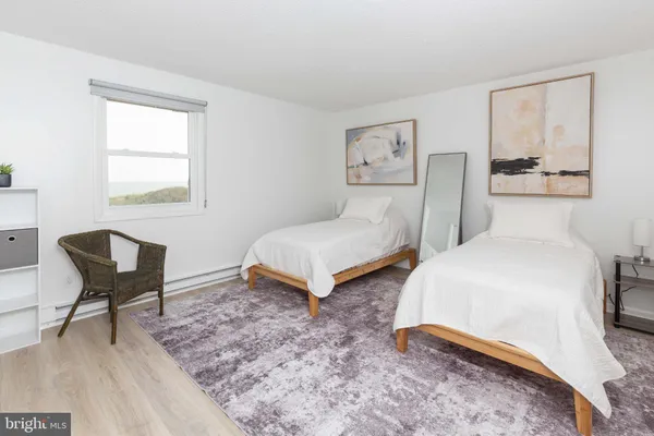 a view of houses with a street