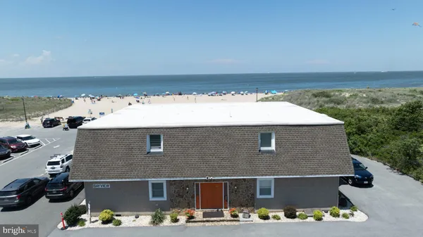 an aerial view of beach and ocean