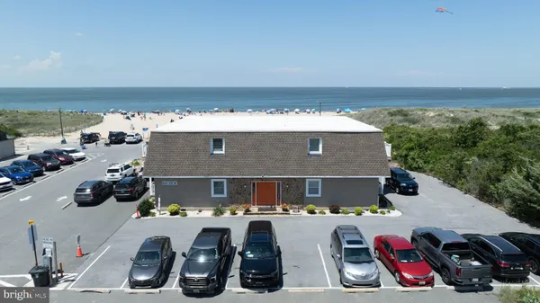 an aerial view of beach and ocean