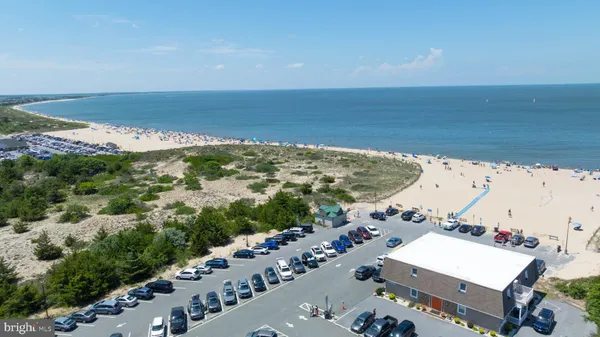 a view of a yard with an ocean view