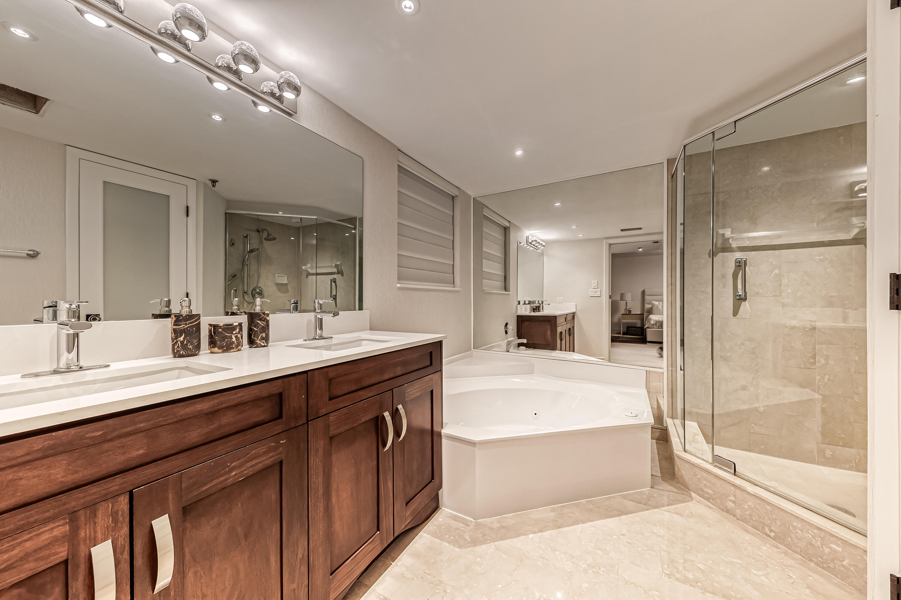 7572 Regency Lake Drive, Unit 402 Boca Raton, FL 33433 - Photo 22 of 31 primary ensuite bathroom