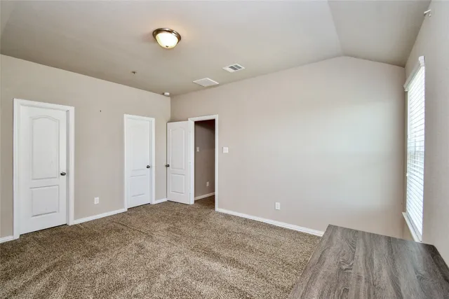 a bathroom with a sink toilet and a mirror