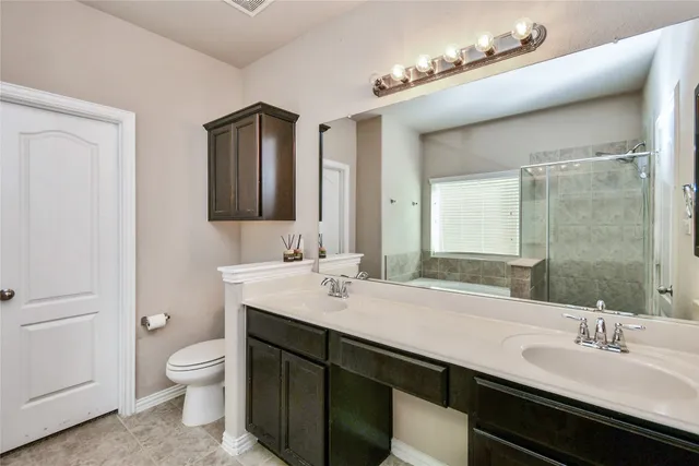 a view of a backyard with sitting area