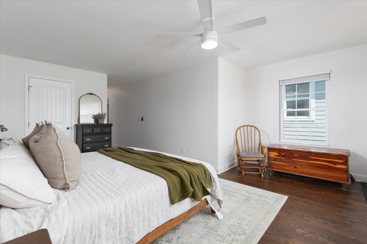 175 B Rural Avenue Nashville, TN 37209 - Photo 16 of 26 a bedroom with a bed and a chandelier