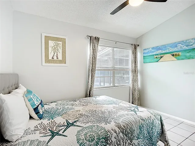 a view of a city from a dining room with large windows