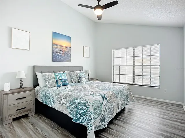 an aerial view of residential house with outdoor space and swimming pool