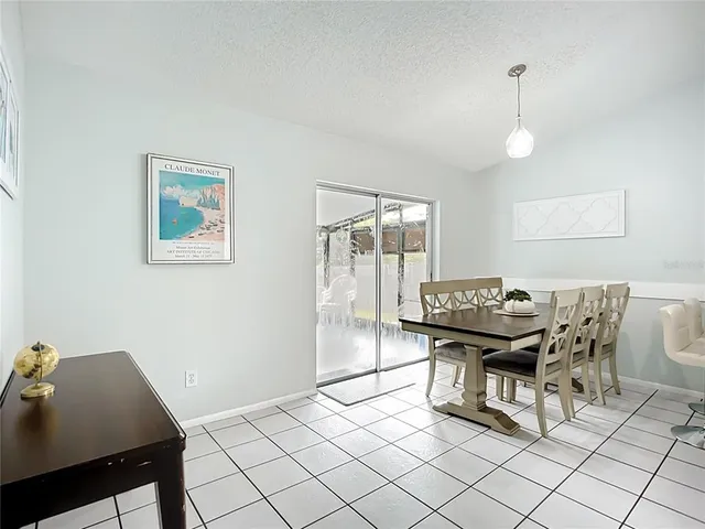 a kitchen with a sink a counter and cabinets