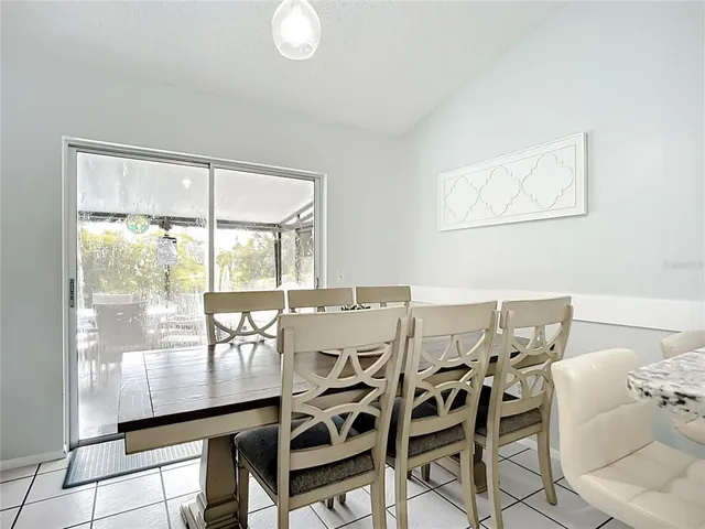a kitchen with a stove sink and microwave
