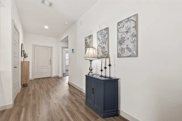 a kitchen with a table and chairs in it