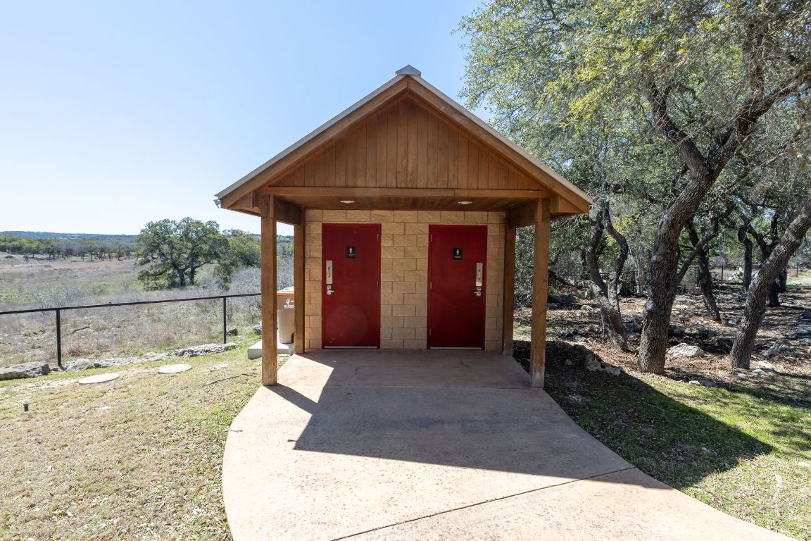 2232 San Jose Way Canyon Lake, TX 78133 - Photo 14 of 16 a view of a small house with backyard