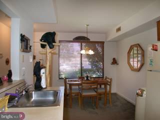 2215 Sandra Road Voorhees, NJ 08043 - Photo 3 of 6 a dining room with furniture and a window