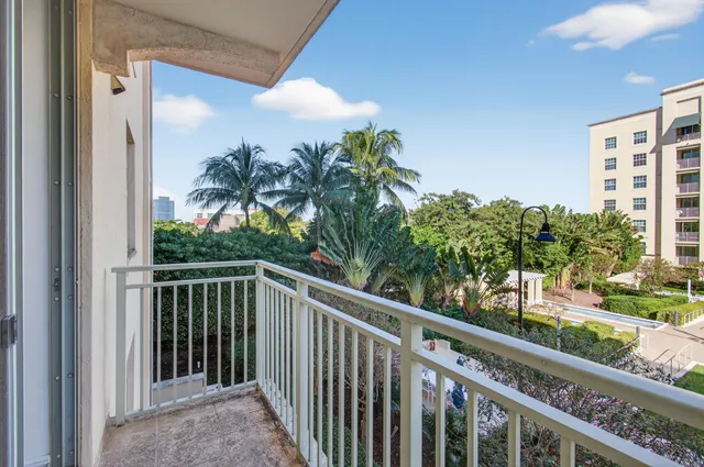 a view of hallway with wooden floor