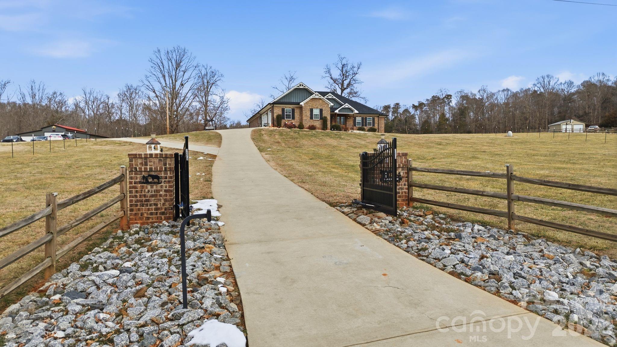 1370 Null Road, Unit 4 Lincolnton, NC 28092 - Photo 2 of 47 a view of a lake with a outdoor space