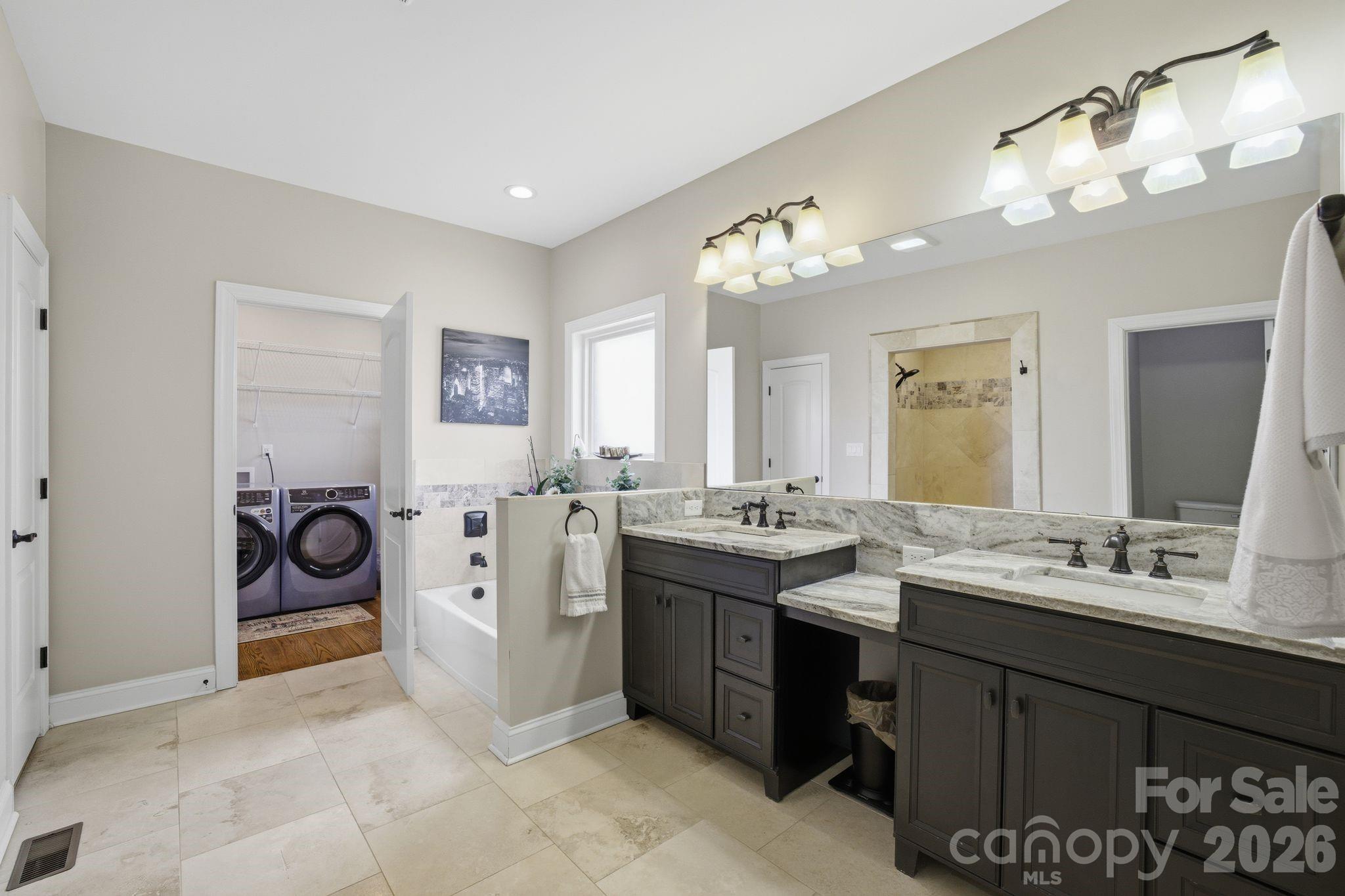 1370 Null Road, Unit 4 Lincolnton, NC 28092 - Photo 22 of 47 a spacious bathroom with a sink double vanity and a mirror