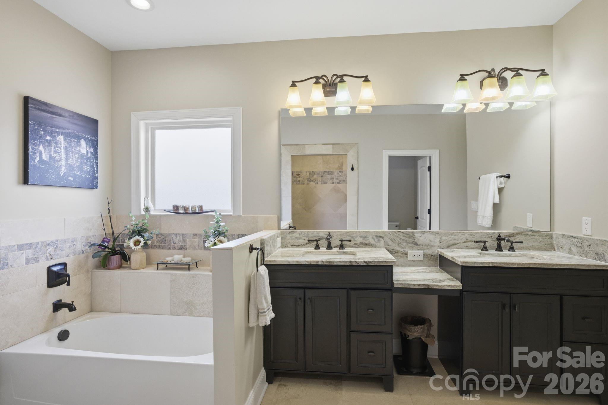 1370 Null Road, Unit 4 Lincolnton, NC 28092 - Photo 23 of 47 a bathroom with a double vanity sink mirror and bathtub